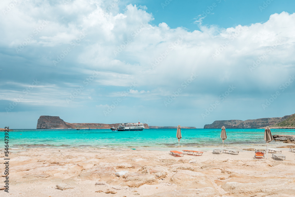 Balos lagoon, crete island, greece: view to gramvoussa island with white sandy beach and turquoise blue water at the main tourist destination near chania