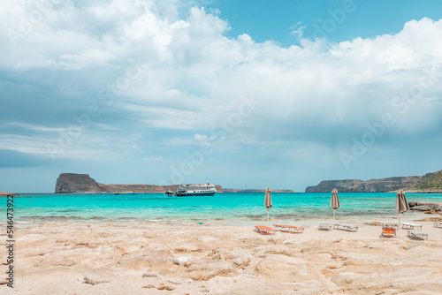 Obraz na płótnie Balos lagoon, crete island, greece: view to gramvoussa island with white sandy beach and turquoise blue water at the main tourist destination near chania w salonie