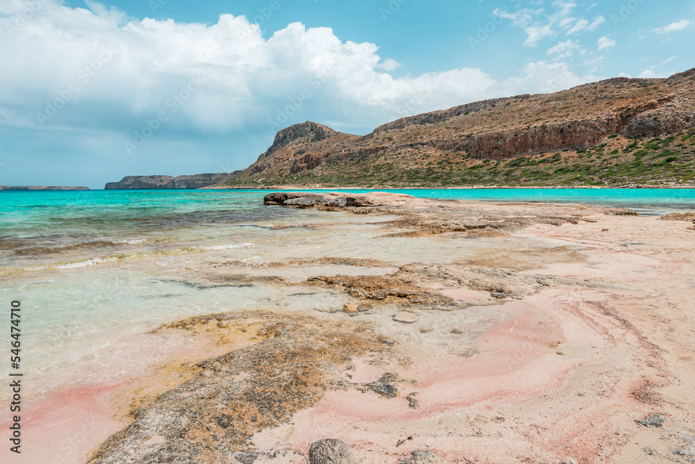 Balos lagoon, crete island, greece: view to gramvoussa island with white sandy beach and turquoise blue water at the main tourist destination near chania