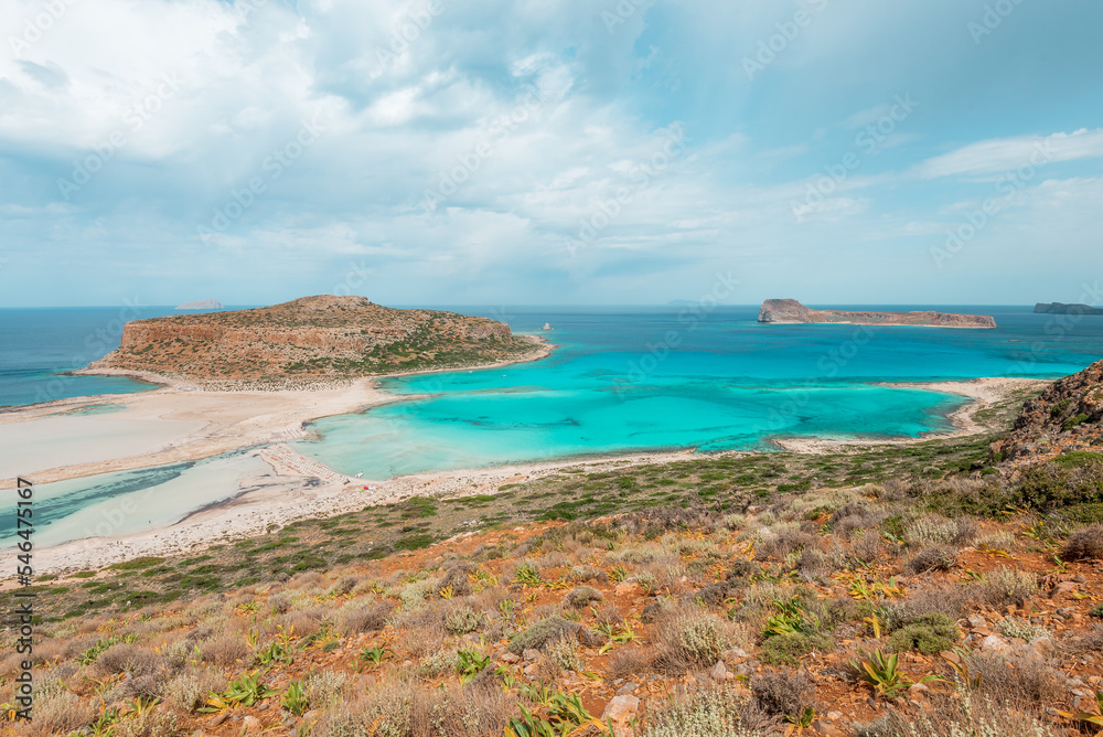 Balos lagoon, crete island, greece: view to gramvoussa and tigani island with white sandy beach and turquoise blue water at the main tourist destination near chania