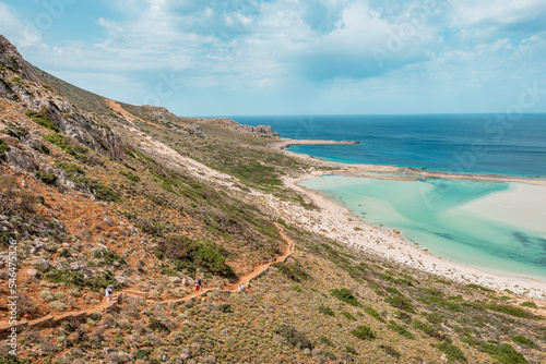 Obraz na płótnie Balos lagoon, crete island, greece: view to gramvoussa island with white sandy beach and turquoise blue water at the main tourist destination near chania w salonie