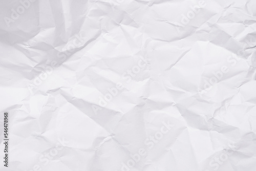 White crumpled paper texture background, clean white wrinkled paper, top view. 