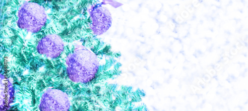 Christmas and New years eve Christmas Background. Beautiful Wide Angle Holiday Template, lilac balls on fir tree highlights.
