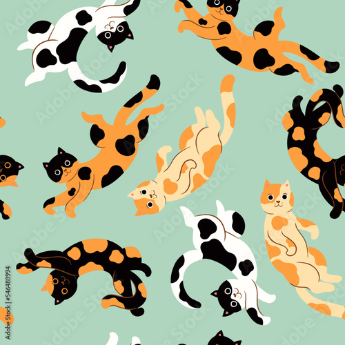 Seamless pattern with cute spotted cats. Vector graphics.