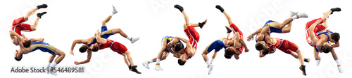 A set of high wrestling throws, tricks. Two young male athletes in blue and red wrestling tights wrestling on a white background photo
