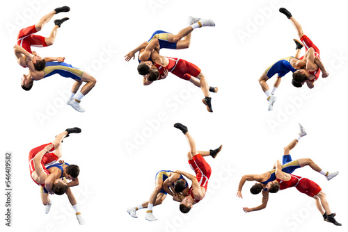 A set of high wrestling throws, tricks. Two young male athletes in blue and red wrestling tights wrestling on a white background photo