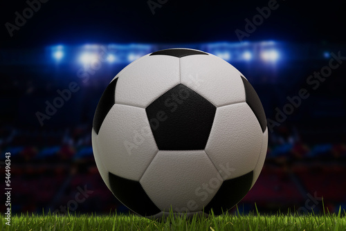 Soccer football ball on a grass pitch in front of stadium lights. 3D Rendering © ink drop