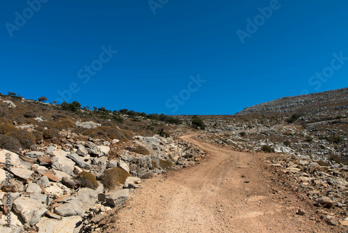Sandy country road, 4x4 off-road trail to the peak of Attavyros mountain. Highest mountain on Rhodes island, Greece.trail. Dodecanese Greece.