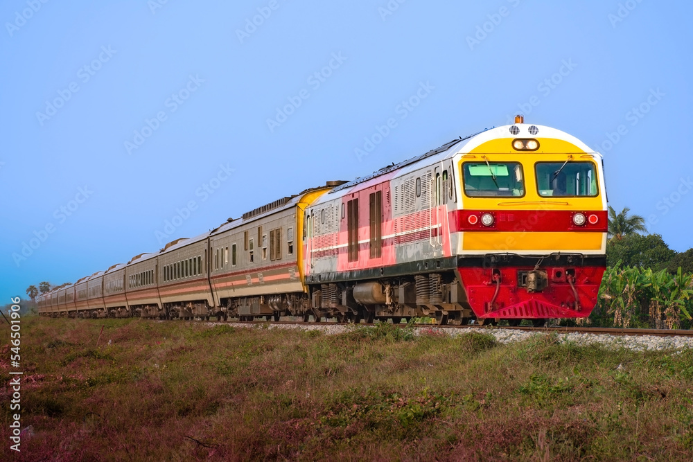 Passenger train by diesel locomotive on the railway. Passenger train by diesel locomotive on the railway.
