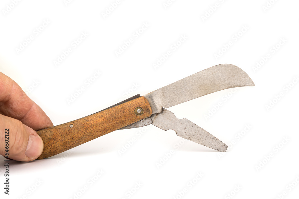 Garden pocket knife with a wooden handle Garden pocket knife with a wooden handle
