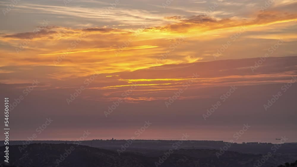 Rising sun in golden sky at dawn on cloudy day. Timelapse
Rising sun in golden sky at dawn on cloudy day. Timelapse