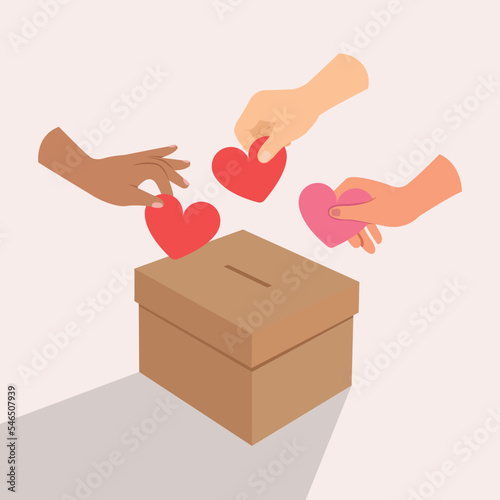 hand holding a red hearts, Red heart symbol is put by person's hand into donation box, charity concept.