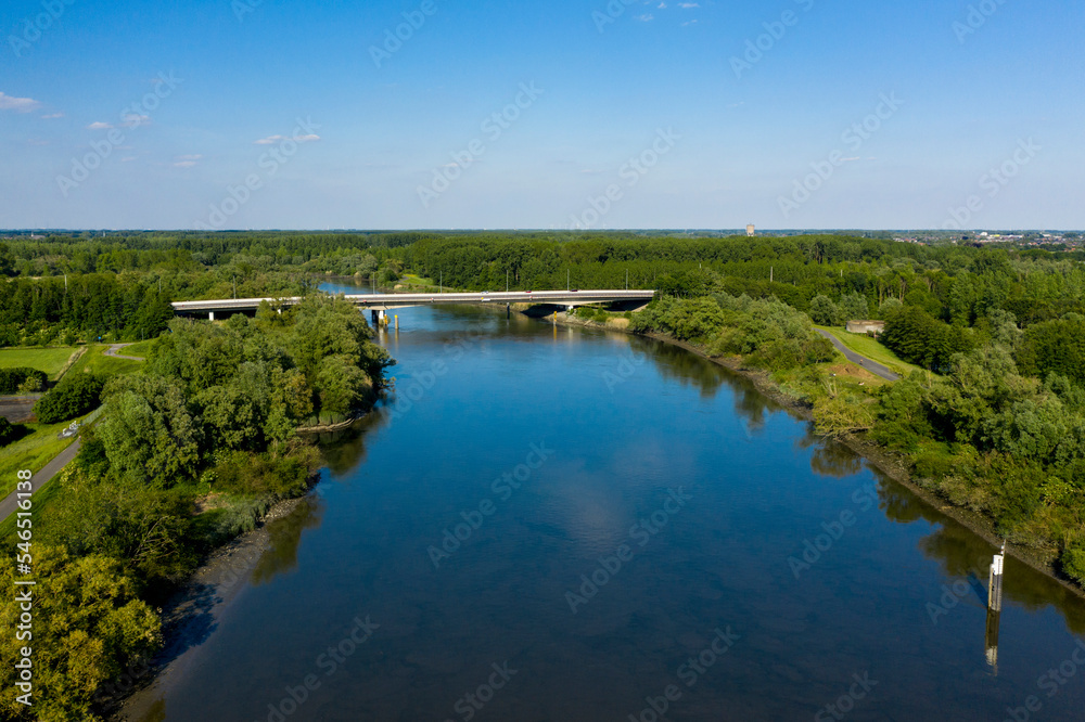 Aerial view of the Scheldt river, in Dendermonde, Belgium