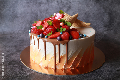 Close-up holiday dessert with strawberries and mint