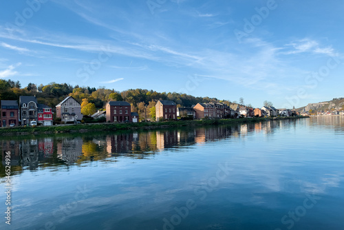 View of the historic town of Dinant with scenic River Meuse in Belgium © Mounir
