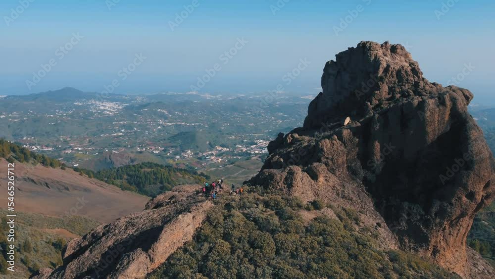 fantastic aerial shot in orbit of the famous Roque Saucillo and where a group of tourists is. On the island of Gran Canaria on a sunny day. fantastic aerial shot in orbit of the famous Roque Saucillo and where a group of tourists is. On the island of Gran Canaria on a sunny day.
