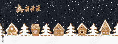 Christmas background. Gingerbread village. Seamless border. There are gingerbread houses, fir trees on dark blue background. Santa Claus is riding across the sky on deer. Vector