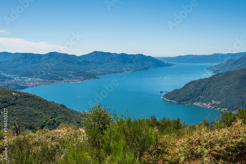 Aerial view of the Lake Maggiore with blue sky from a mountain © Alessio