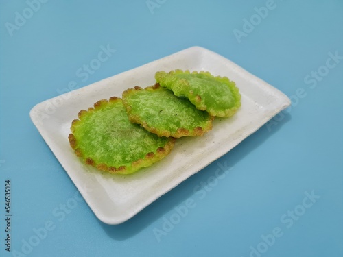 A market snack made from flour and other ingredients is called kue kucur green photo