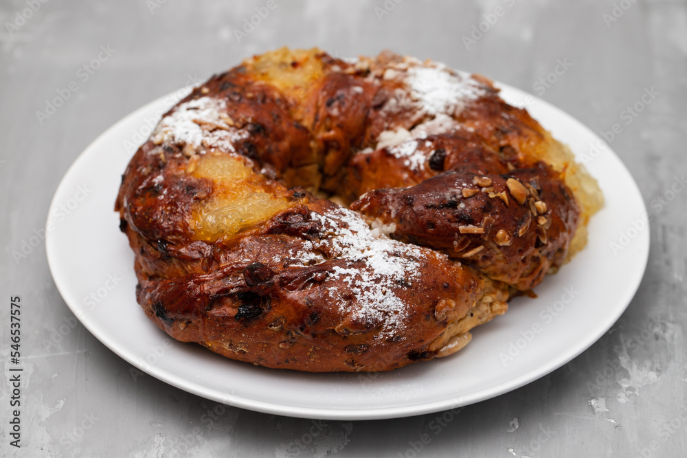 typical portuguese fruit cake Bolo rainha on plate typical portuguese fruit cake Bolo rainha on plate