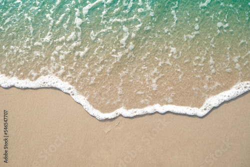 Fototapeta Naklejka Na Ścianę i Meble -  Wave of blue ocean on sandy beach. Background