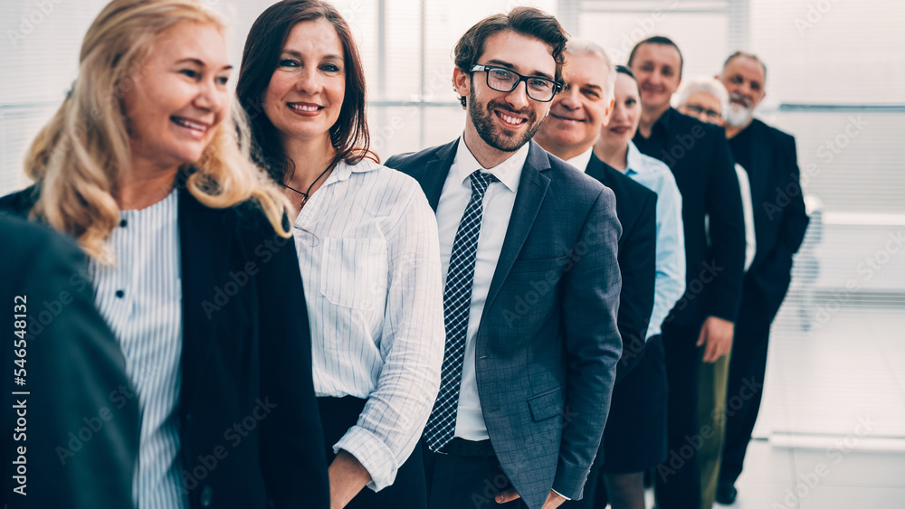 close up. a group of company specialists standing in a row