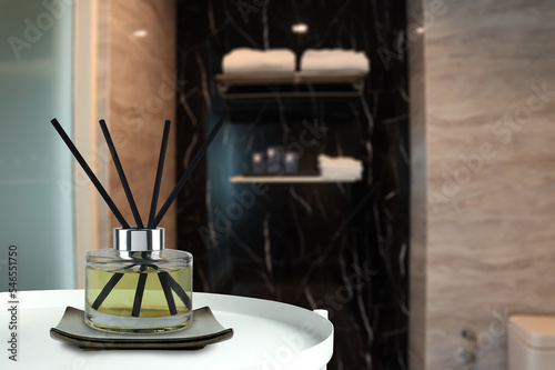 luxury glass aroma scent reed diffuser bottle is used as air freshener in the nice design bath room toilet to creat relax , cozy and clean ambient and for decoration