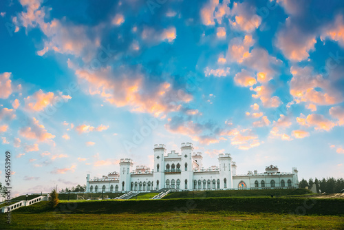 Kosava, Belarus. Summer Sun Shine Above Kosava Castle. Puslowski Palace Castle. Ruined Castellated Palace In Gothic Revival Style. Landmark And Heritage.