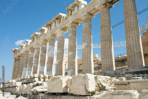 Parthenon temple, old Greek ruins at sunny day in Acropolis of Athens, Greece. Acropolis of Athens on hill with amazing and beautiful ruins Parthenon