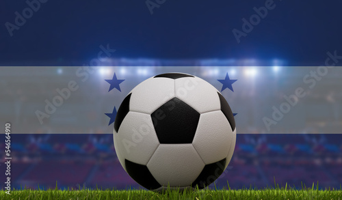 Soccer football ball on a grass pitch in front of stadium lights and honduras flag. 3D Rendering