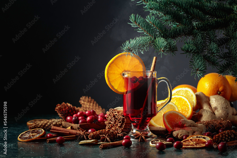 Hot Christmas drink with spices. - obrazy, fototapety, plakaty 
