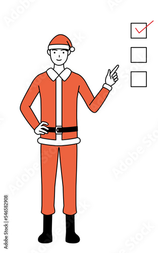 チェックリストを指さすサンタクロース姿の男性