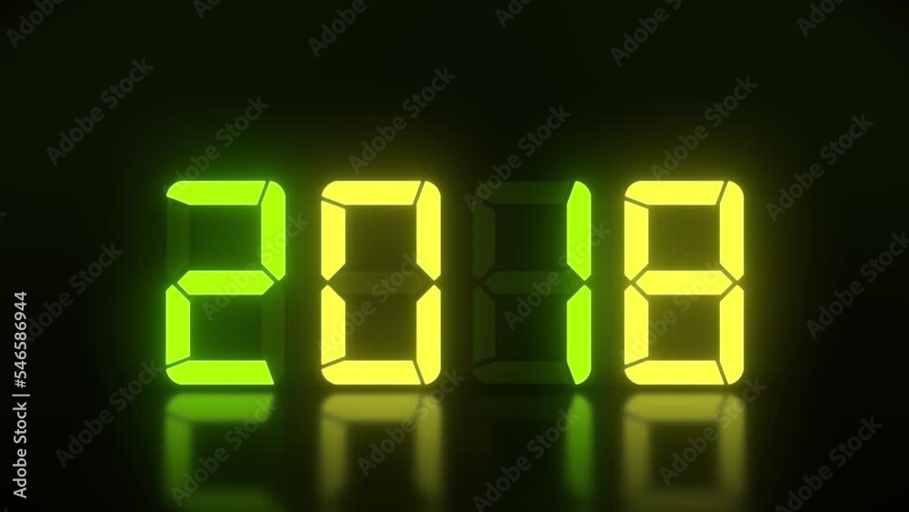 Video animation of an LED display in green and yellow with the continuous years 2000 to 2023 on a reflective floor - represents the new year 2023 - holiday concept Video animation of an LED display in green and yellow with the continuous years 2000 to 2023 on a reflective floor - represents the new year 2023 - holiday concept