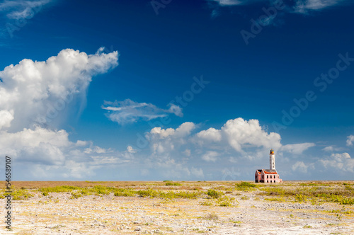 Lonely lighthouse at the desertic Klein Curacao island, close to Curacao, Netherland Antilles photo