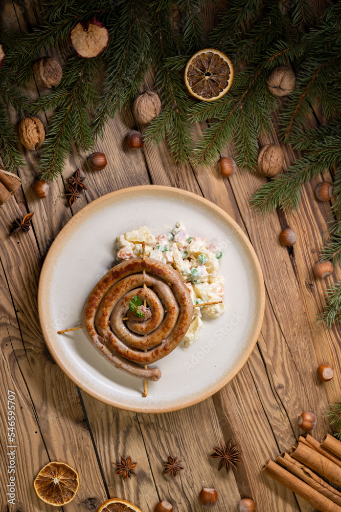 Christmas wine sausage served with potato salad Christmas wine sausage served with potato salad
