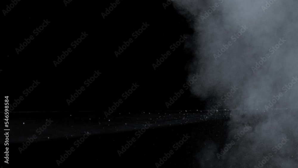 Abstract white smoke in slow motion. Smoke, Cloud of cold fog in light spot background. Light, white, fog, cloud, black background, 4k, ice smoke cloud. Floating fog.