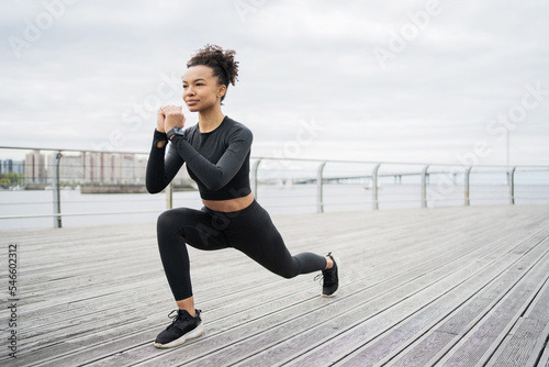 Woman sports lifestyle fitness in the city cardio endurance training. Sports tight comfortable clothes.