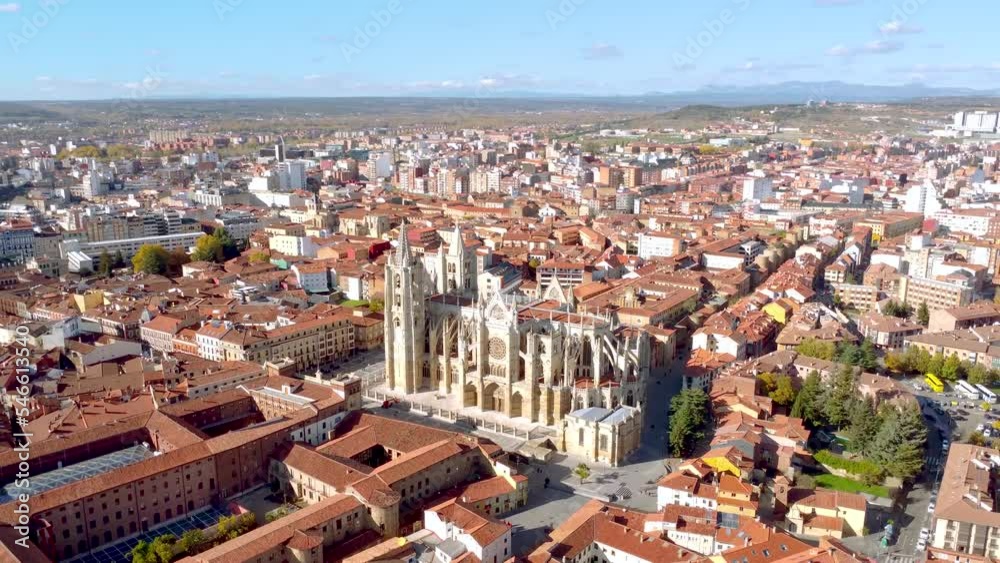 Aerial perspective of Santa María de Regla de León Cathedral. A Catholic church initiated in the 13th century, it is one of the greatest works of the Gothic style, with French influences. Pan right. Aerial perspective of Santa María de Regla de León Cathedral. A Catholic church initiated in the 13th century, it is one of the greatest works of the Gothic style, with French influences. Pan right.