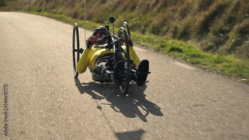 Athlete with disability training with His Handbike on a Track. High quality 4k footage photo