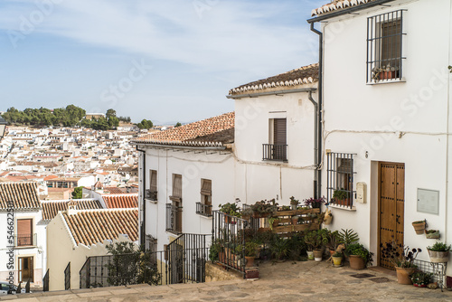 Fototapeta Naklejka Na Ścianę i Meble -  The historic center of the old town of Antequera. Historic brick church. small white buildings and narrow streets. horizontal, daylight