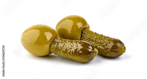 Green olives with cucumber. MANZANILLA Green olives stuffed with gherkin. Close up. Isolated on white background photo