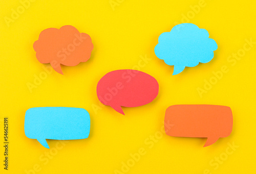 Speech bubbles arranged on a yellow background