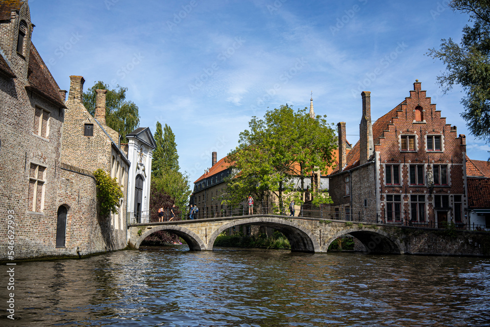 Bruges, Belgium: the Begijnhof Bridge seen from the canal