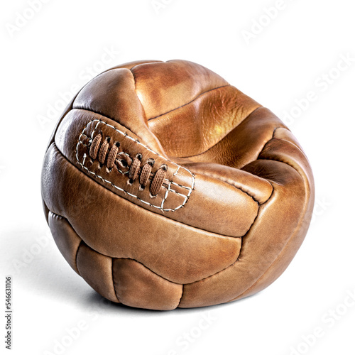 deflated vintage soccer ball on a white