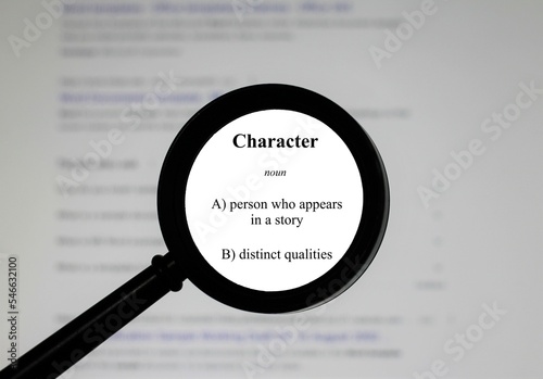 Selective focus on word character, word in a dictionary. Close up of an English dictionary page with the word character.
