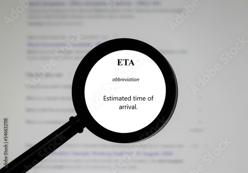 Selective focus on the abbreviation of the word ETA, word in a dictionary. Close up of an English dictionary page with word ETA.