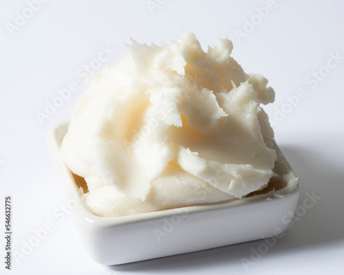 Small plate of lard on white background photo