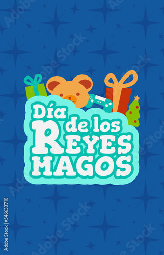 "Día de los reyes magos" letrero con juguetes y regalos encima.