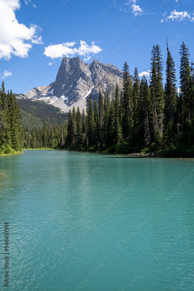 Beautiful Emerald Lake in Yoho National Park, teal water shines in the sunlight