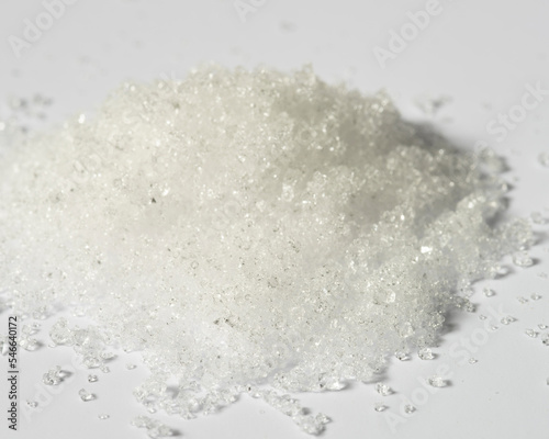 Alum powder, potassium aluminum sulfate powder on white background